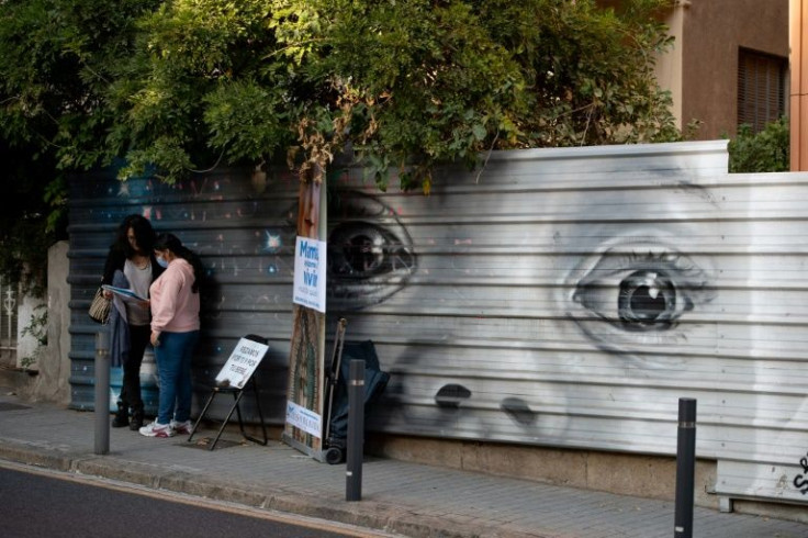 Anti-abortion activists, like those seen here in Barcelona, often set up shop outside of abortion clinics