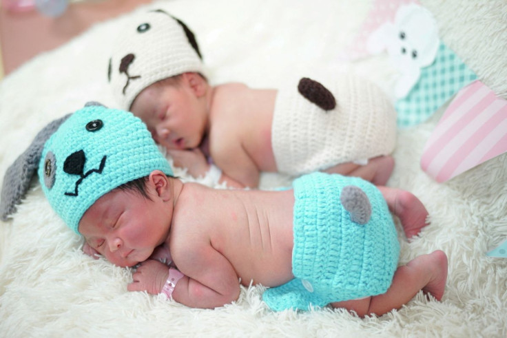 Newborn babies wearing dog costumes to celebrate the New Year of the Dog are pictured at the nursery room of Paolo Chokchai 4 Hospital in Bangkok, Thailand, December 28, 2017.