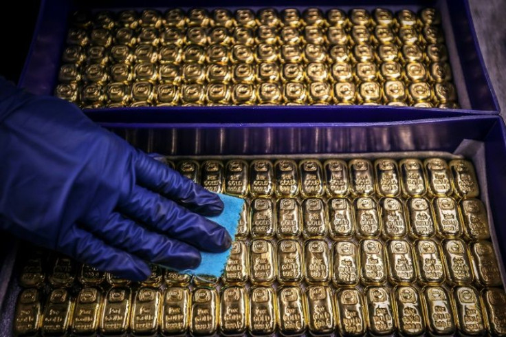 Gold -- a key go-to in times of crisis and turmoil -- hit as much as $2,000.86
