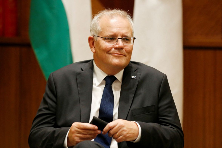 Australian Prime Minister Scott Morrison speaks to the media at Melbourne Commonwealth Parliament Office, in Melbourne, Australia February 11, 2022. Darrian Traynor/Pool via 