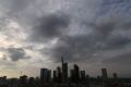 Dark clouds are seen over the skyline with its bank towers in Frankfurt, Germany, October 23, 2016.   