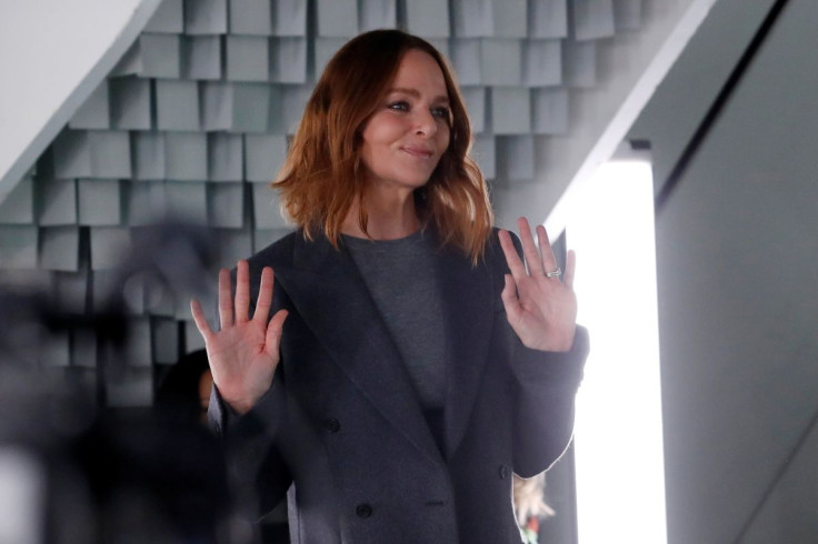 Designer Stella McCartney appears at the end of her Summer 2022 women's ready-to-wear collection show during Paris Fashion Week in Paris, France, October 4, 2021. 