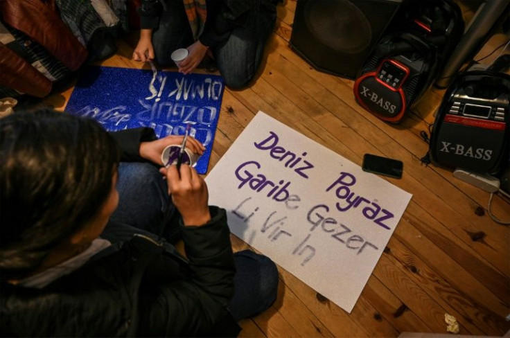 Activists painted banners with the names of murdered Turkish women