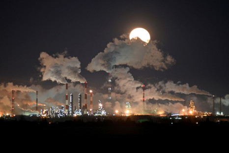 Full moon rises over the Gazprom Neft's oil refinery in Omsk, Russia February 10, 2020. 