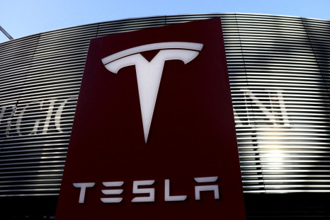 A logo of the electric vehicle maker Tesla is seen near a shopping complex in Beijing, China January 5, 2021. 