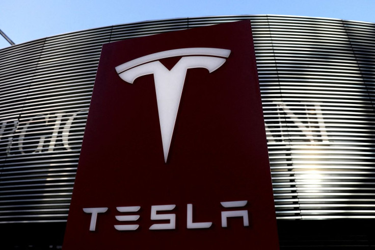 A logo of the electric vehicle maker Tesla is seen near a shopping complex in Beijing, China January 5, 2021. 