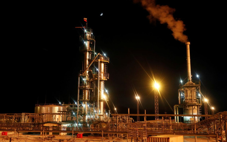 A Russian state flag flies on the top of a diesel plant in the Yarakta Oil Field, owned by Irkutsk Oil Company (INK), in Irkutsk Region, Russia March 10, 2019.   