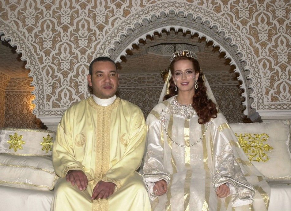 Morocco039s King Mohammed VI poses with his bride unveiled Salma Bennani for an official photograph.