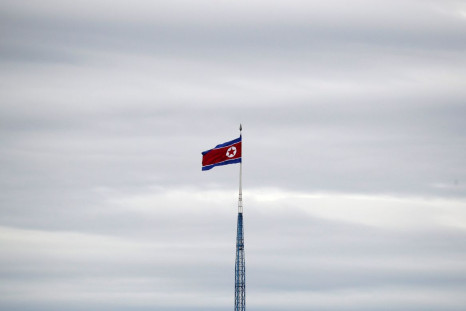 A North Korean flag flutters on top of a 160-metre tower in North Korea's propaganda village of Gijungdong, in this picture taken from the Tae Sung freedom village near the Military Demarcation Line (MDL), inside the demilitarised zone separating the two 