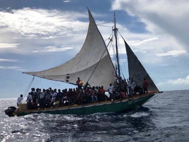 More than 100 migrants aboard a 35-foot sailing vessel is interdicted by a Coast Guard Station Miami law enforcement crew approximately 12 miles east of Biscayne Bay, Florida, U.S., September 16, 2021. U.S. Coast Guard/Handout via REUTERS