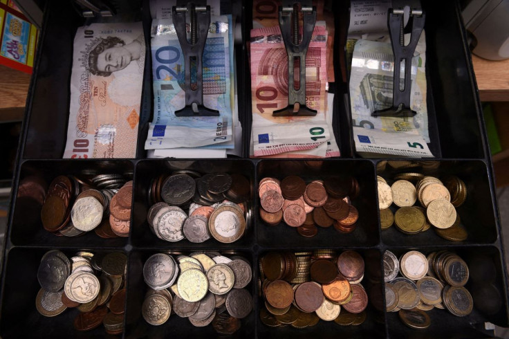 A shop cash register is seen with both Sterling and Euro currency in the till at the border town of Pettigo, Ireland October 14, 2016.