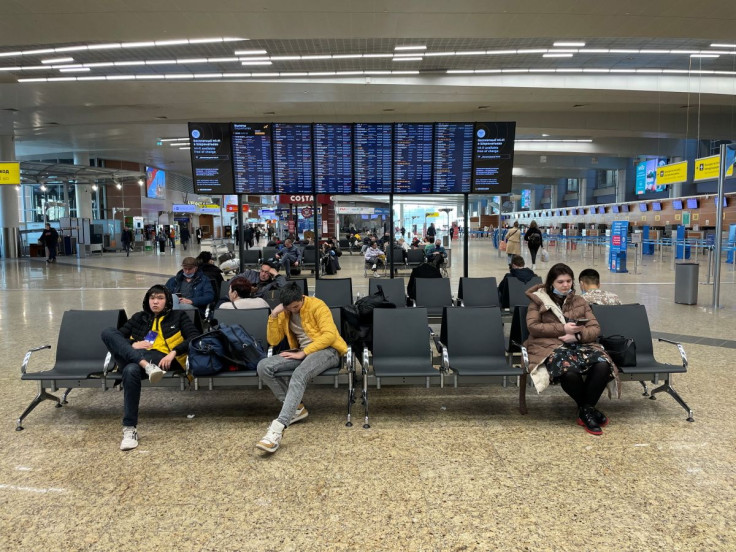 Passengers are seen at Sheremetyevo airport, after Russia closed its airspace to airlines from 36 countries in response to Ukraine-related sanctions targeting its aviation sector, in Moscow, Russia February 28, 2022.  