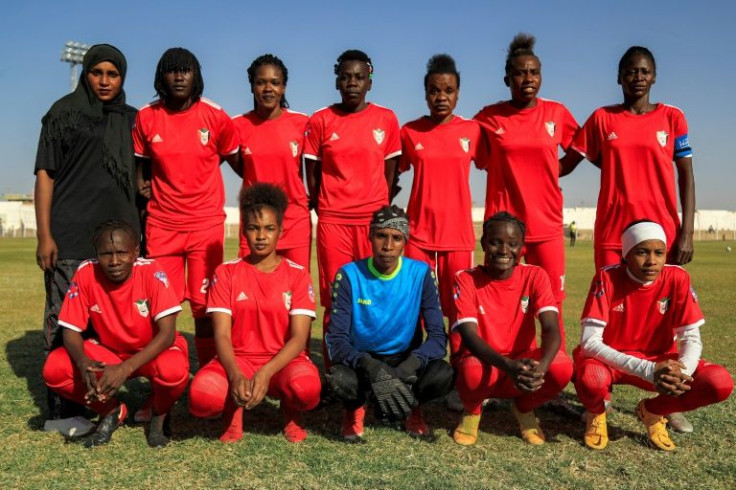 The starting 11 of Sudan's national women's team -- first formed in 2021 -- posed before a FIFA friendly match against South Sudan at Jebel Awliaa stadium in Khartoum on February 16, 2022