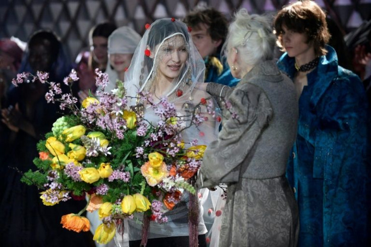 Vivienne Westwood's colourful, cabaret-inspired show was a contrast to the largely sombre mood