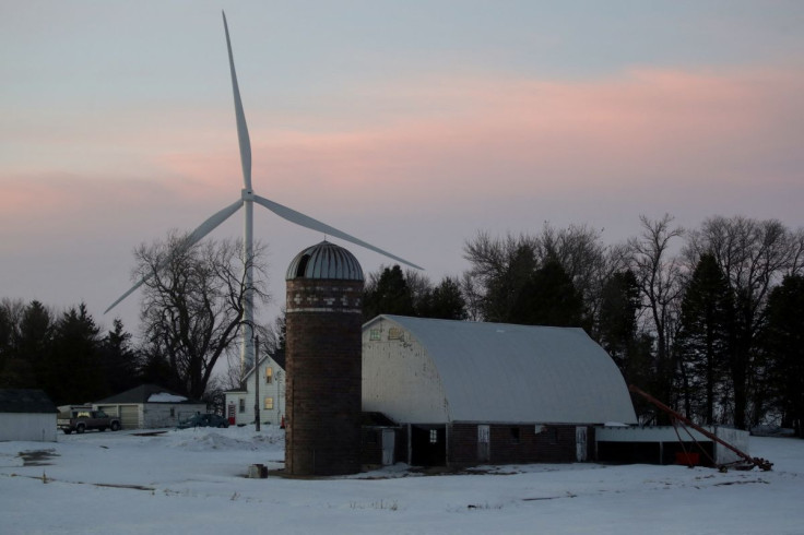 A wind farm shares space with farmland the day before the Iowa caucuses, where agriculture and clean energy are key issues, in Latimer, Iowa, U.S. February 2, 2020. 