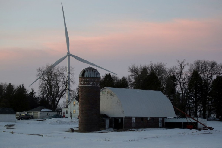 A wind farm shares space with farmland the day before the Iowa caucuses, where agriculture and clean energy are key issues, in Latimer, Iowa, U.S. February 2, 2020.