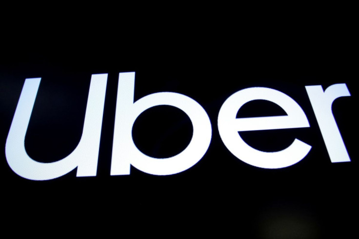 A screen displays the company logo for Uber Technologies Inc. on the day of it's IPO at the New York Stock Exchange (NYSE) in New York, U.S., May 10, 2019. 