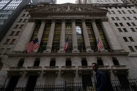 A person walks past the New York Stock Exchange (NYSE) in Manhattan, New York City, U.S., March 7, 2022. 