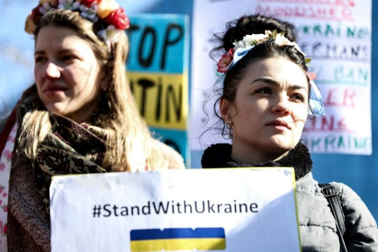 In Europe, some used the occasion of International Women's Day to hold rallies urging support for war-torn Ukraine, such as these protesters in Brussels