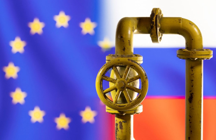 A model of the natural gas pipeline is seen in front of displayed word EU and Russia flag colours in this illustration taken March 8, 2022. 