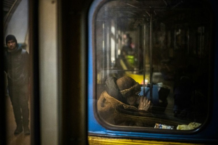 A Russian missile strike in Kyiv killed five people just above one metro station, convincing many to remain underground