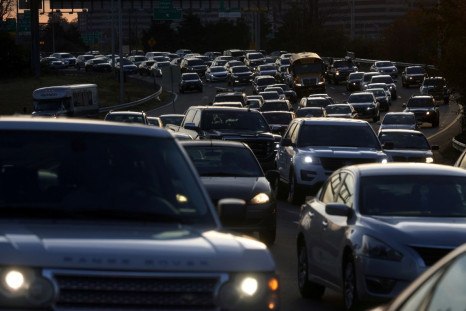 Vehicles stack up in traffic on their way towards Washington, D.C., via I-395 N in Arlington, Virginia, U.S., November 24, 2021. 