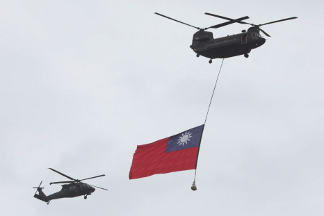 A Taiwan flag flews across the sky during National Day celebrations in Taipei, Taiwan, October 10, 2020. 