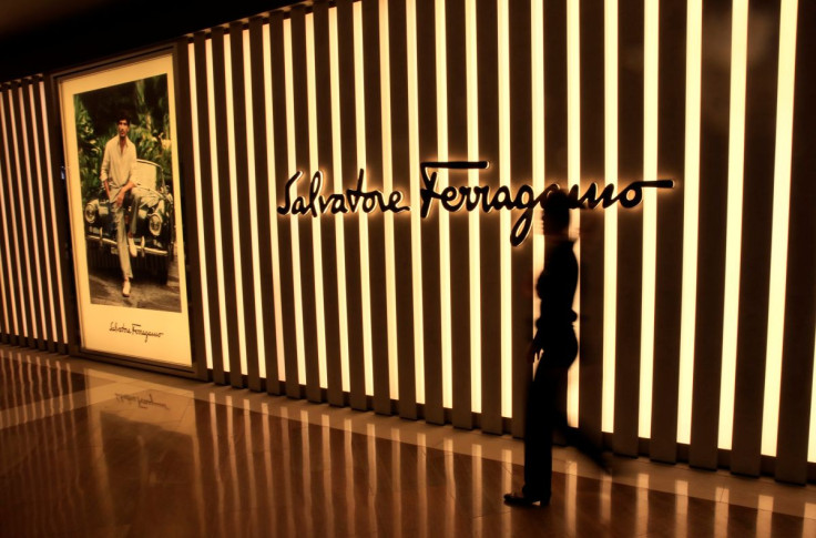 A woman walks past a Salvatore Ferragamo shop in Singapore May 19, 2017.
