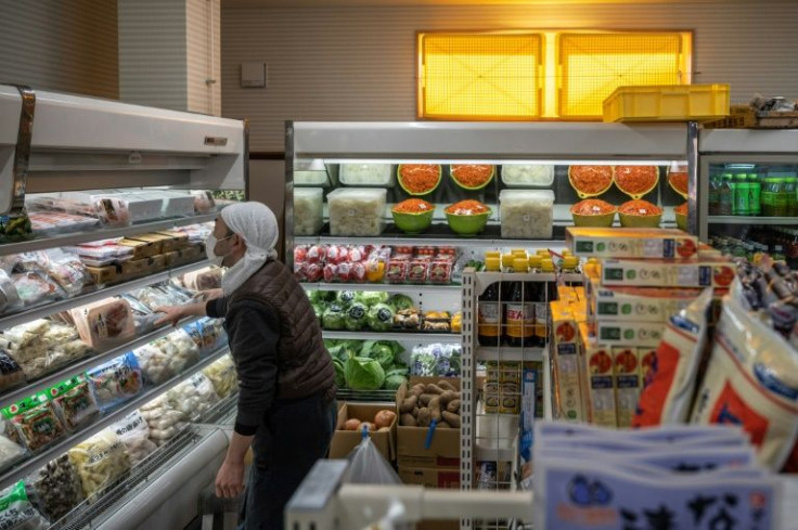 Hideaki Ishii, a worker in a family-owned restaurant and grocery store in Katsurao