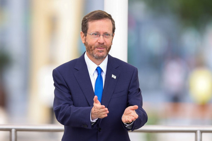 Israeli President Isaac Herzog stands to speak during Israel's National Day ceremony at Expo 2020 Dubai, in Dubai, United Arab Emirates, January 31, 2022.