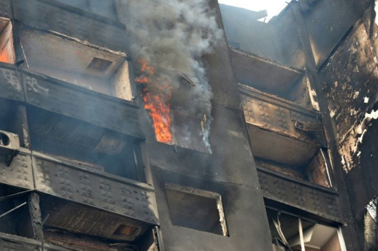 A building burns after Russian shelling in the second largest Ukrainian city of Kharkiv on March 6