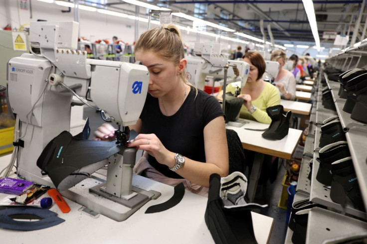Women sew parts for shoes at the Skrebic footware factory, in Teslic, Bosnia and Herzegovina, February 17, 2022. Picture taken February 17, 2022.