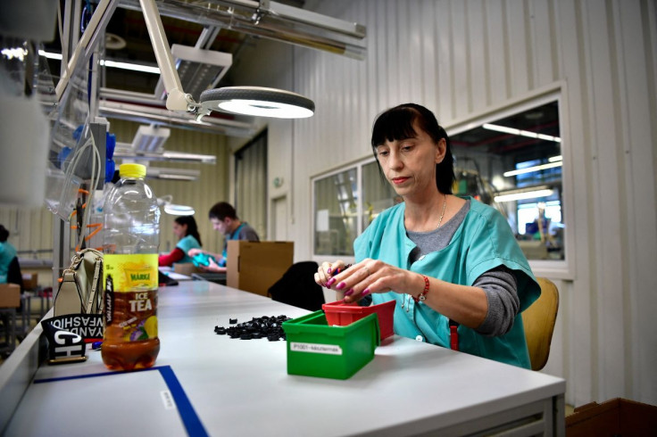 Svetlana Bocskai is seen working at Pepperl+Fuchs, a German industrial sensor factory, after she went back to rescue her pregnant daughter from the war, following Russia's invasion of Ukraine, in Veszprem, Hungary March 8, 2022. Picture taken March 8, 202