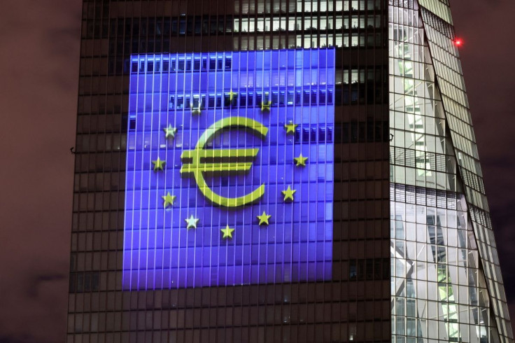 A symphony of light consisting of bars, lines and circles in blue and yellow, the colours of the European Union, illuminates the south facade of the European Central Bank (ECB) headquarters in Frankfurt, Germany, December 30, 2021.