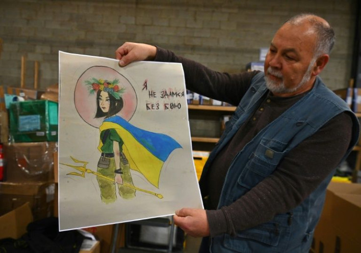 A drawing to be slipped into a humanitarian aid box en route to Ukraine