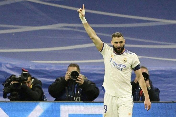 Hat-trick star: Real Madrid's French forward Karim Benzema celebrates
