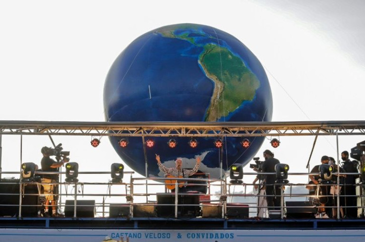 Brazilian musician Caetano Veloso performs during a demo against President Jair Bolsonaro's environmental policies outside the Congress building in Brasilia, on March 9, 2022