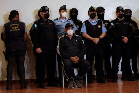 Former police chief Juan Carlos "El Tigre" Bonilla, wanted by the United States on drug-trafficking charges, is presented to the media at a police base following his detention after being on the run for several months, in Tegucigalpa, Honduras March 9, 20
