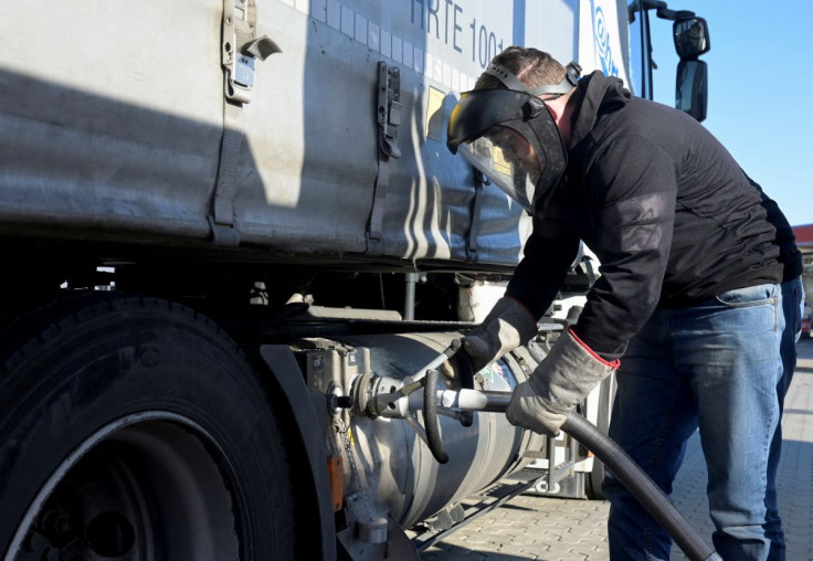 A truck driver fills his tank at a LNG (Liquefied Natural Gas) filling station, after Russia's invasion of Ukraine, in Soltau, Germany, March 2, 2022. 