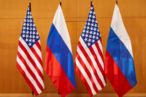 Russian and U.S. flags are pictured before talks between Russian Deputy Foreign Minister Sergei Ryabkov and U.S. Deputy Secretary of State Wendy Sherman at the United States Mission in Geneva, Switzerland January 10, 2022. 