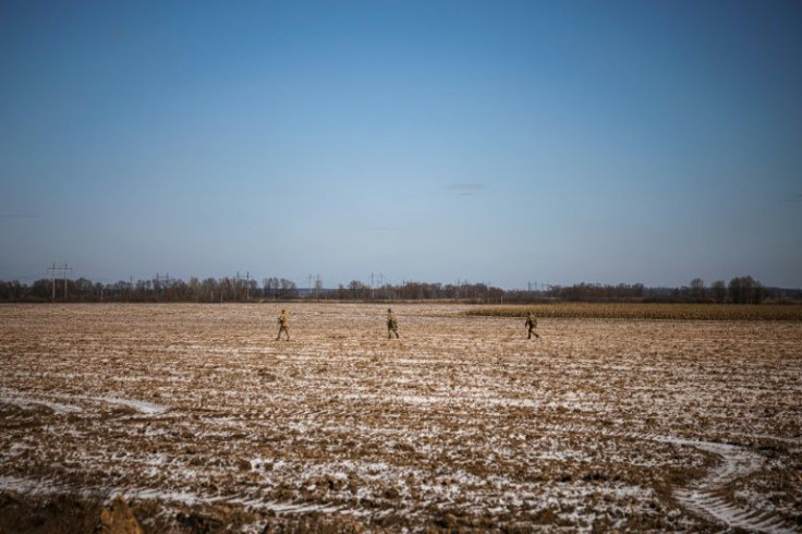 The open fields on Kyiv's northeastern edge are lightly patrolled by Ukrainian soldiers and regularly shelled by advancing Russian forces