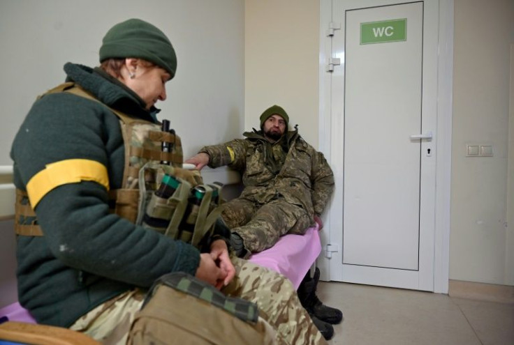 Injured Ukrainian soldiers now receive treatment in a maternity clinic after mothers and children were evacuated from the frontline area