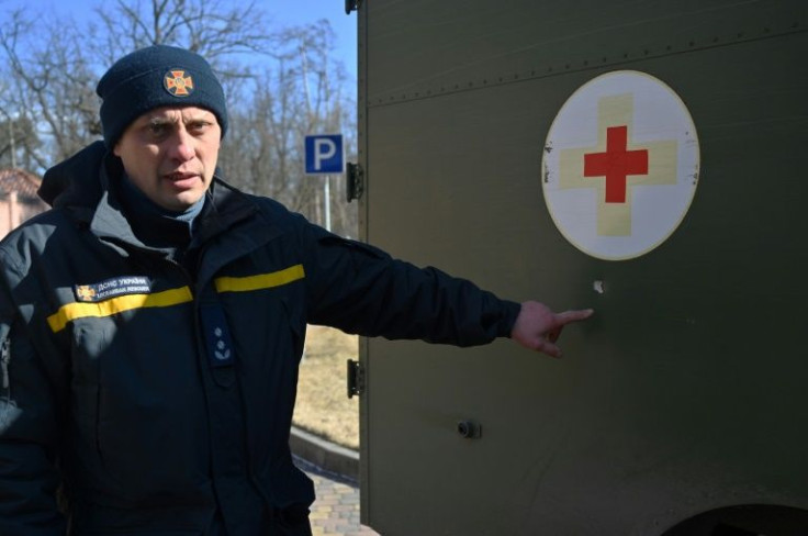 Vasyl Oksak, the local commander in Ukraine's civil rescue service, says the red cross medical symbol does not protect military ambulances