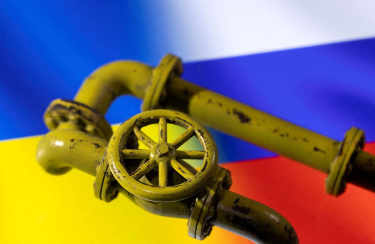 3D printed Natural Gas Pipes are placed on displayed Russia's and Ukraine's flags in this illustration taken, January 31, 2022.