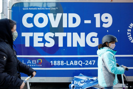 Children are seen outside a coronavirus disease (COVID-19) testing site in Brooklyn, New York, U.S., January 12, 2022.  