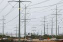Power lines are shown as California consumers prepare for more possible outages following weekend outages to reduce system strain during a brutal heat wave amid the outbreak of coronavirus disease (COVID-19) in Carlsbad, California, U.S., August 17, 2020.
