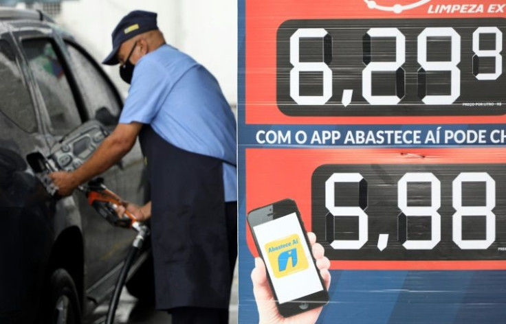 An employee works at a gas station in downtown Sao Paulo, Brazil in December 2021