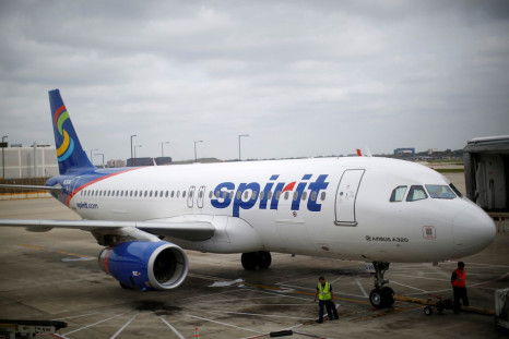 A Spirit Airlines Airbuys A320-200 airplane sits at a gate at the O'Hare Airport in Chicago, Illinois October 2, 2014.