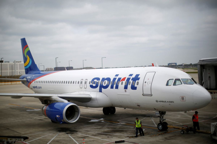 A Spirit Airlines Airbuys A320-200 airplane sits at a gate at the O'Hare Airport in Chicago, Illinois October 2, 2014.