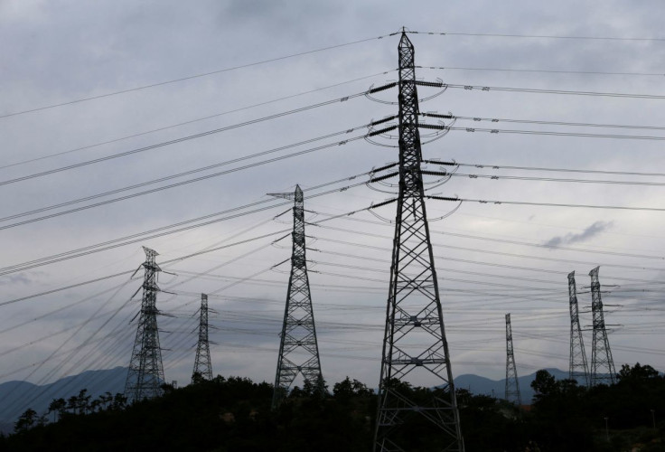 Power transmission towers are seen near the plant of new Shin Kori No. 3 reactor and No. 4 reactor of state-run utility Korea Electric Power Corp (KEPCO) in Ulsan, about 410 km (255 miles) southeast of Seoul, September 3, 2013.  